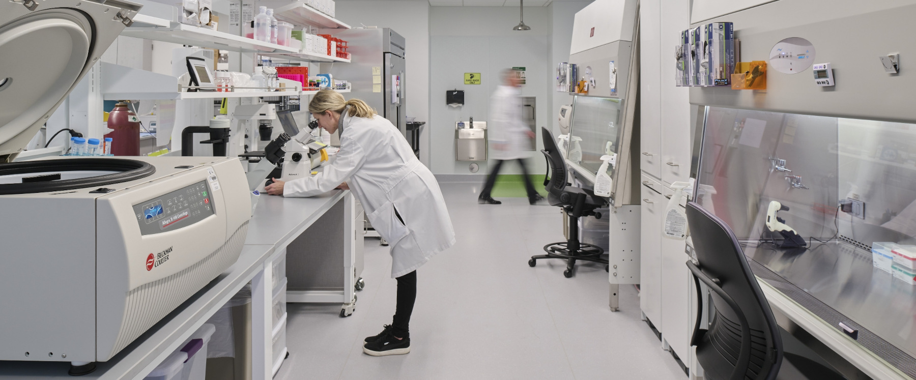 Flad Architects Scientists working at Mayo Clinic biomanufacturing facility laboratory