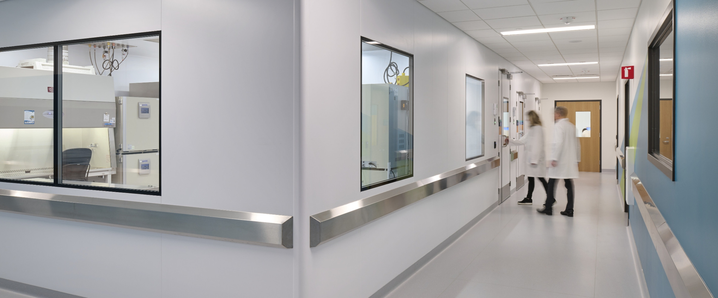 Flad Architects Scientific Staff entering Laboratory