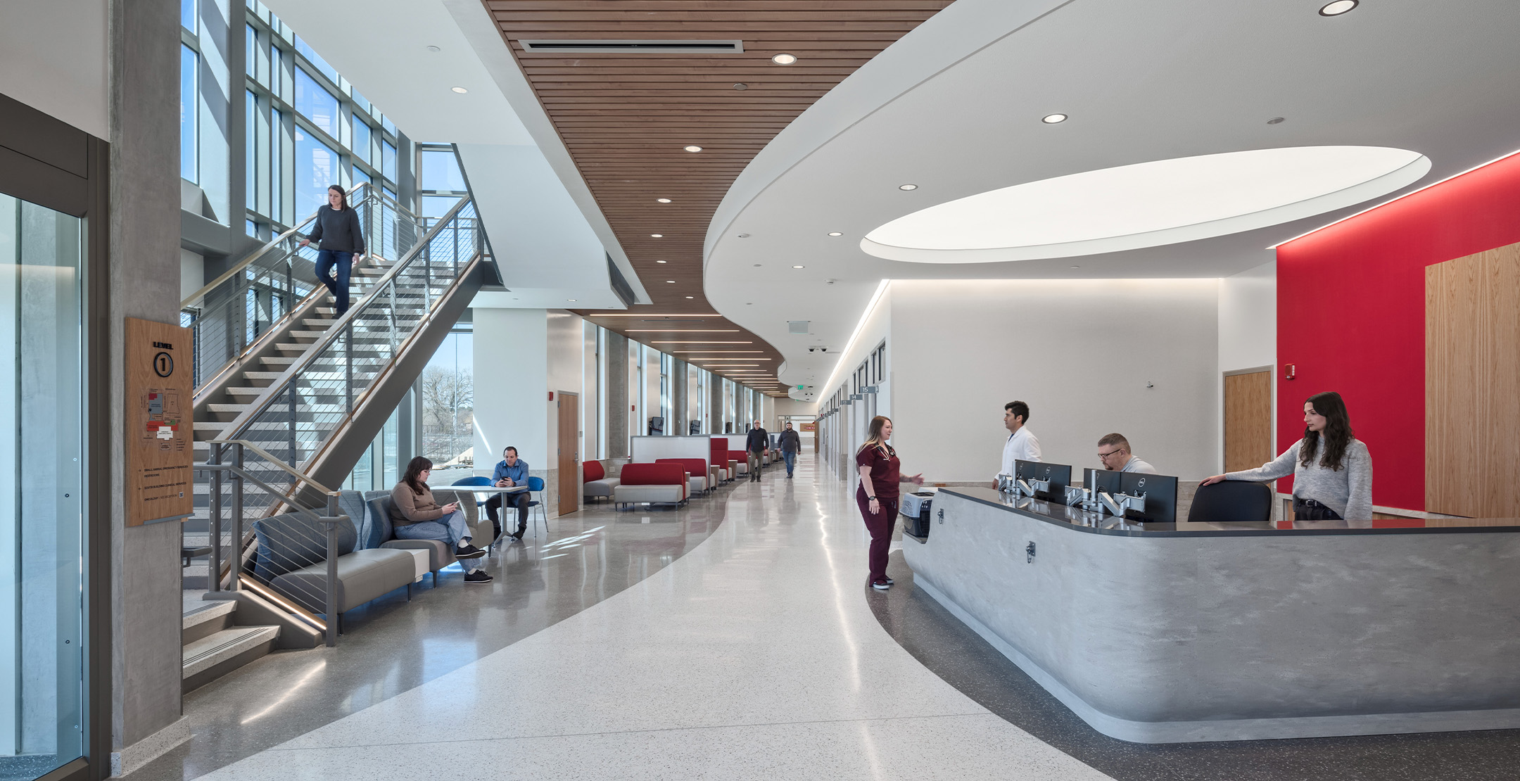 Employees using workplace open collaboration space